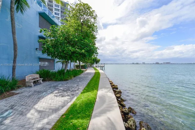 a view of a patio with a table chairs and a patio