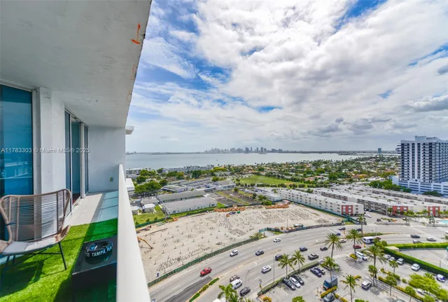 a view of a balcony with city view