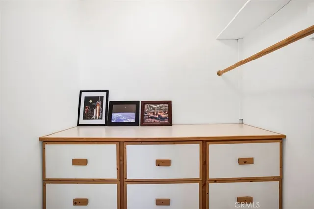 a view of a swimming pool with a lounge chairs