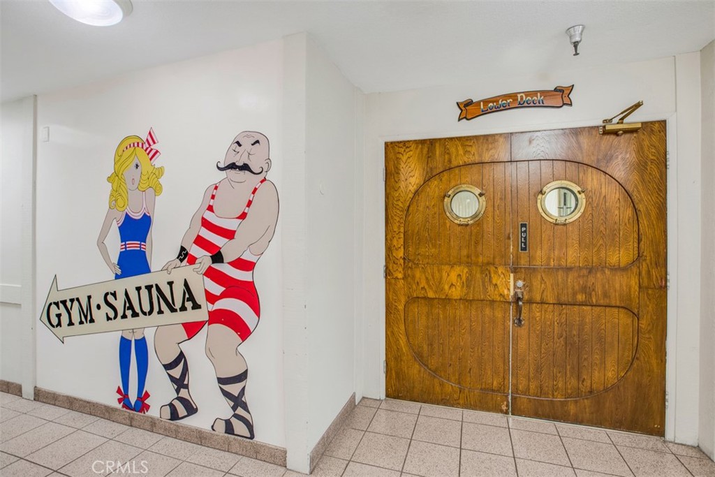 1140 East Ocean Boulevard, Unit 235 Long Beach, CA 90802 - Photo 34 of 45 a bathroom with a cabinet and a shower