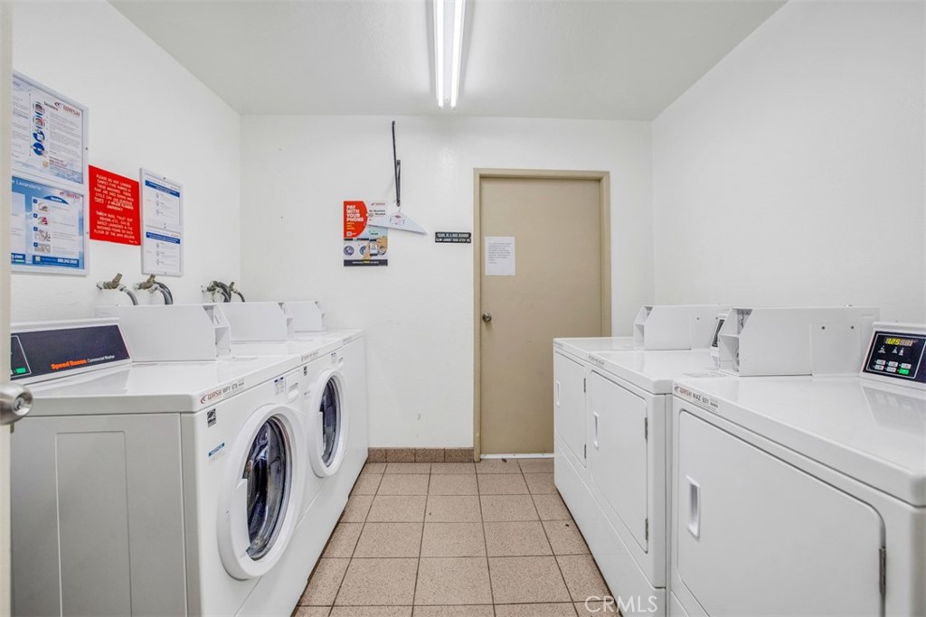 1140 East Ocean Boulevard, Unit 235 Long Beach, CA 90802 - Photo 36 of 45 a utility room with dryer and washer