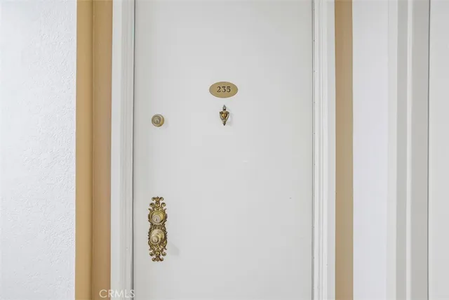 a dining room with a table and chairs