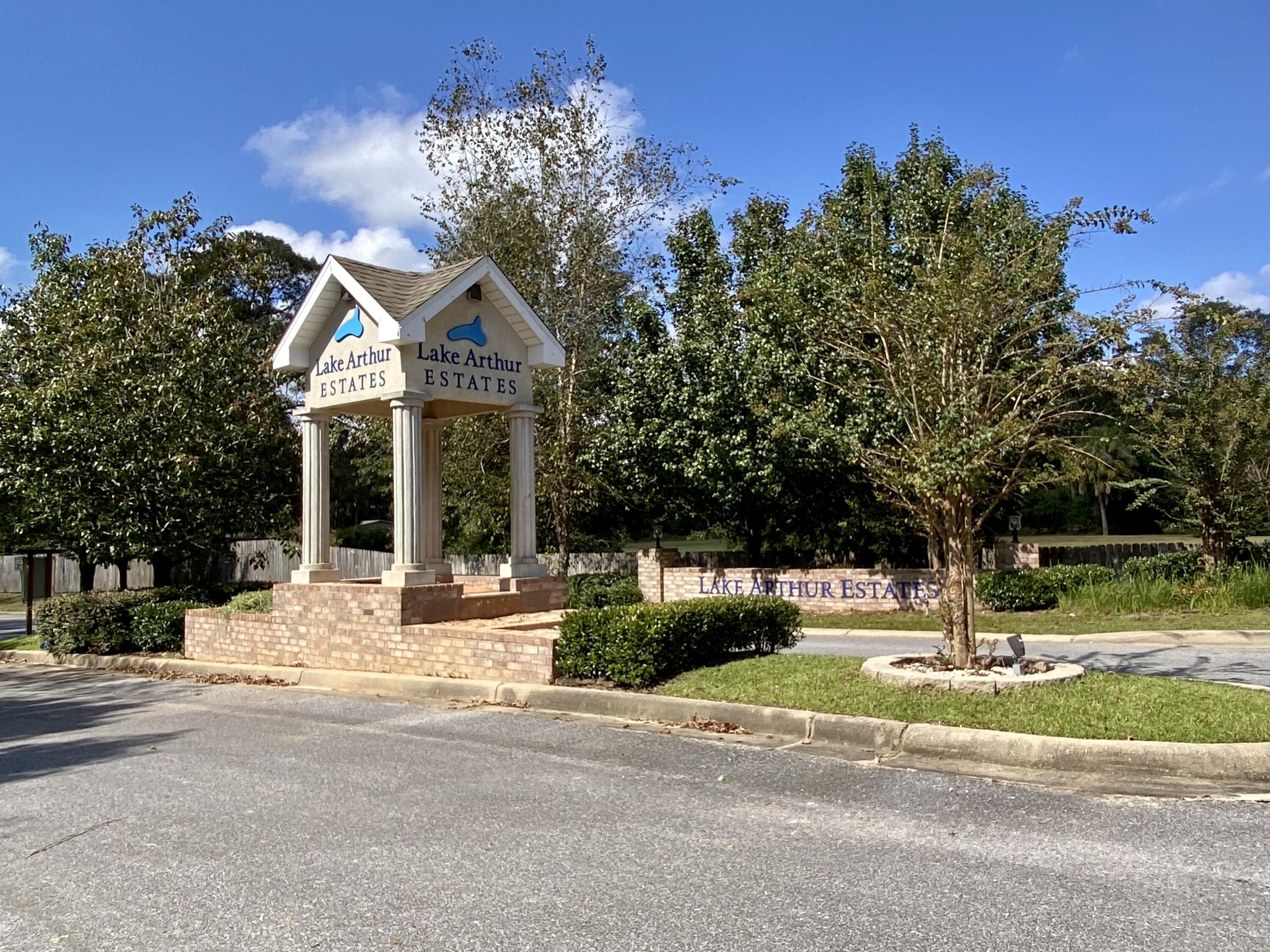 3062 Zach Avenue Crestview, FL 32536 - Photo 2 of 18 a house with trees in the background