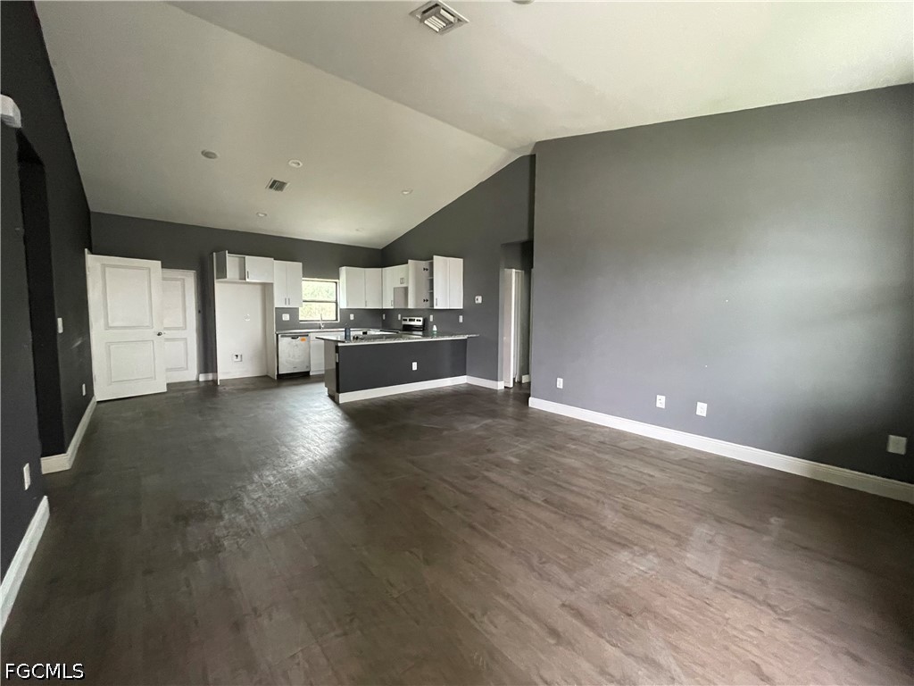 8046 Memory Circle LaBelle, FL 33935 - Photo 3 of 10 a view of a livingroom with wooden floor