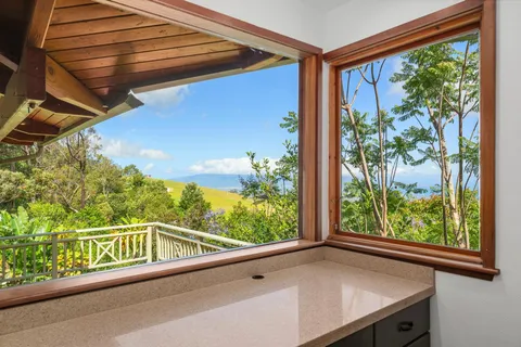 a view of a balcony with an outdoor space