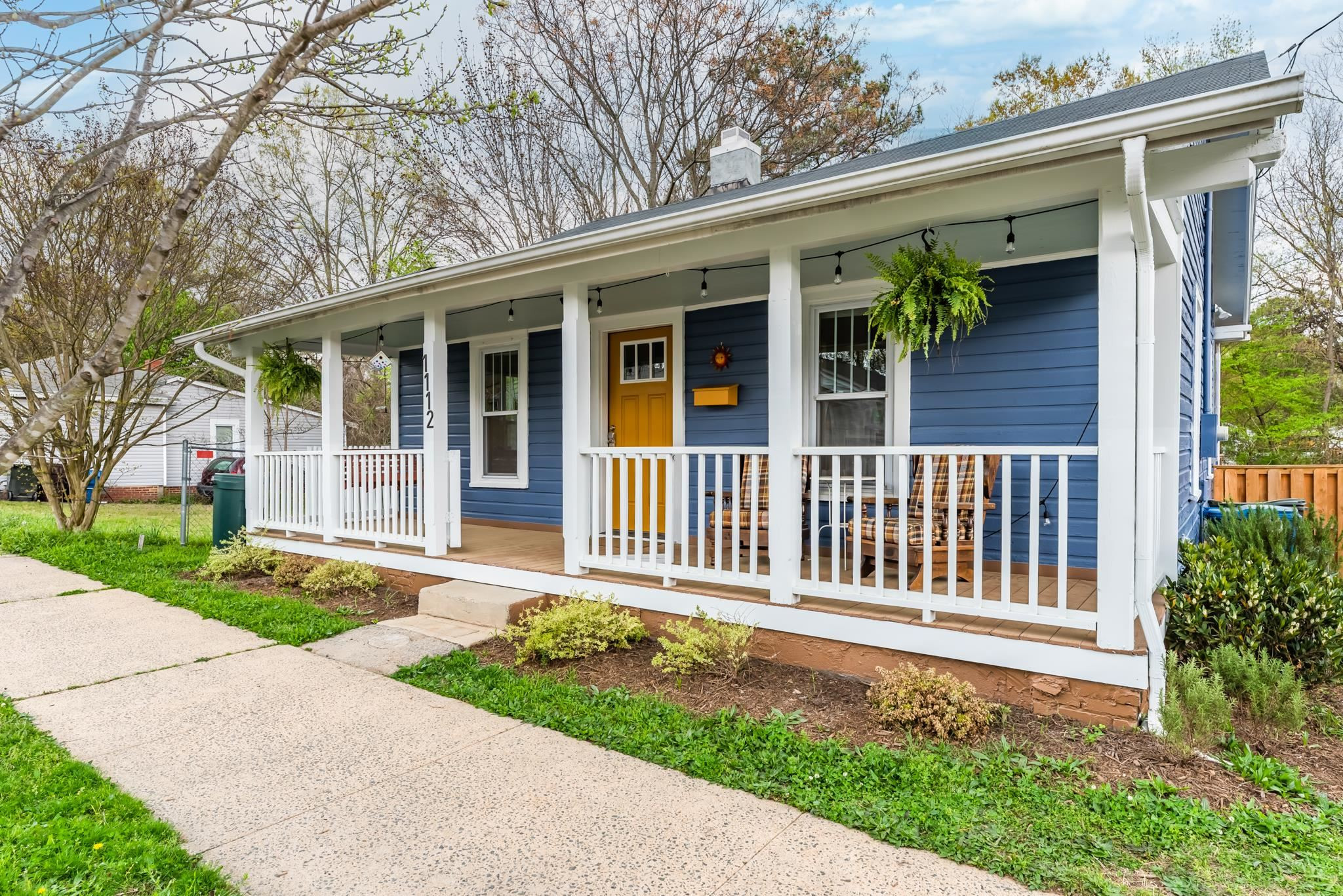 1112 Berkeley Street Durham, NC 27705 - Photo 15 of 23 front view of a house with a yard