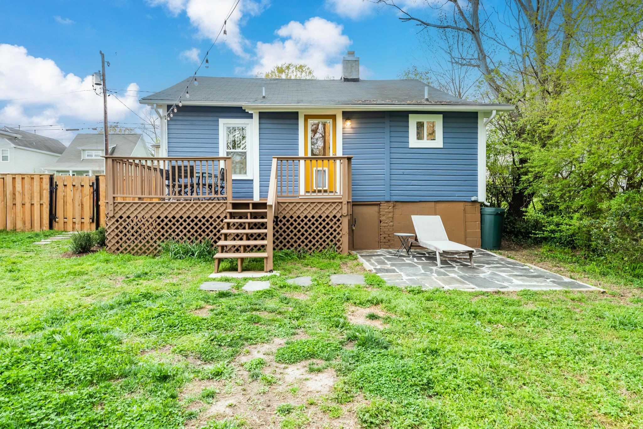 1112 Berkeley Street Durham, NC 27705 - Photo 17 of 23 a front view of a house with a yard