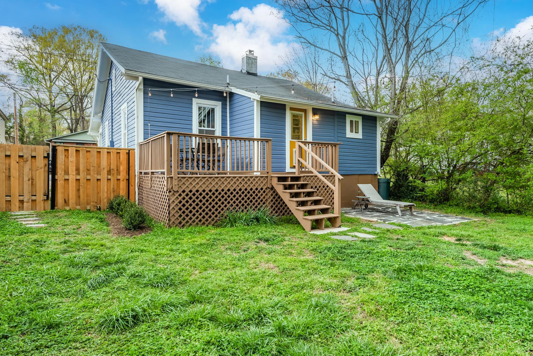1112 Berkeley Street Durham, NC 27705 - Photo 18 of 23 a view of a house with a yard