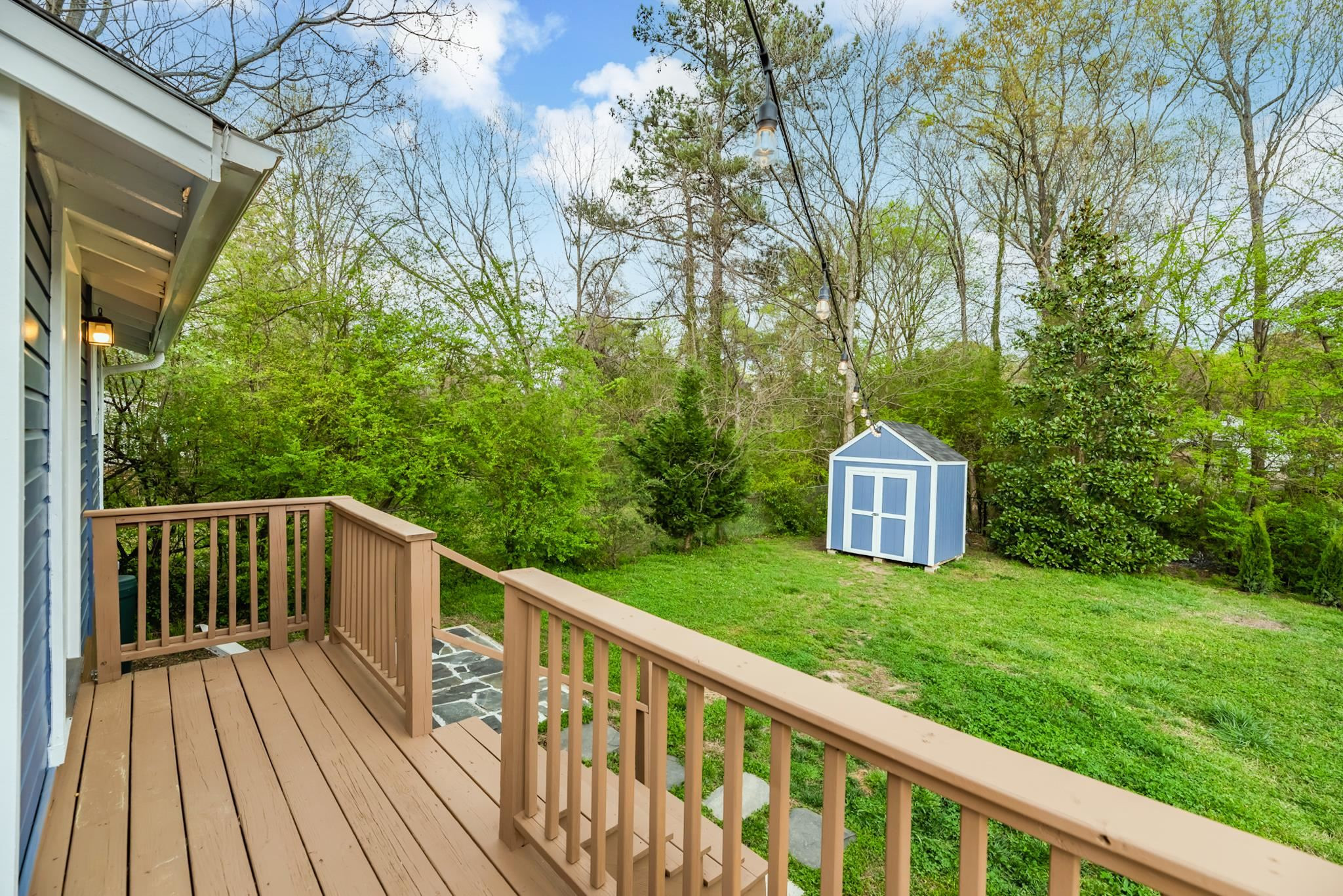 1112 Berkeley Street Durham, NC 27705 - Photo 20 of 23 a view of a wooden deck with a yard