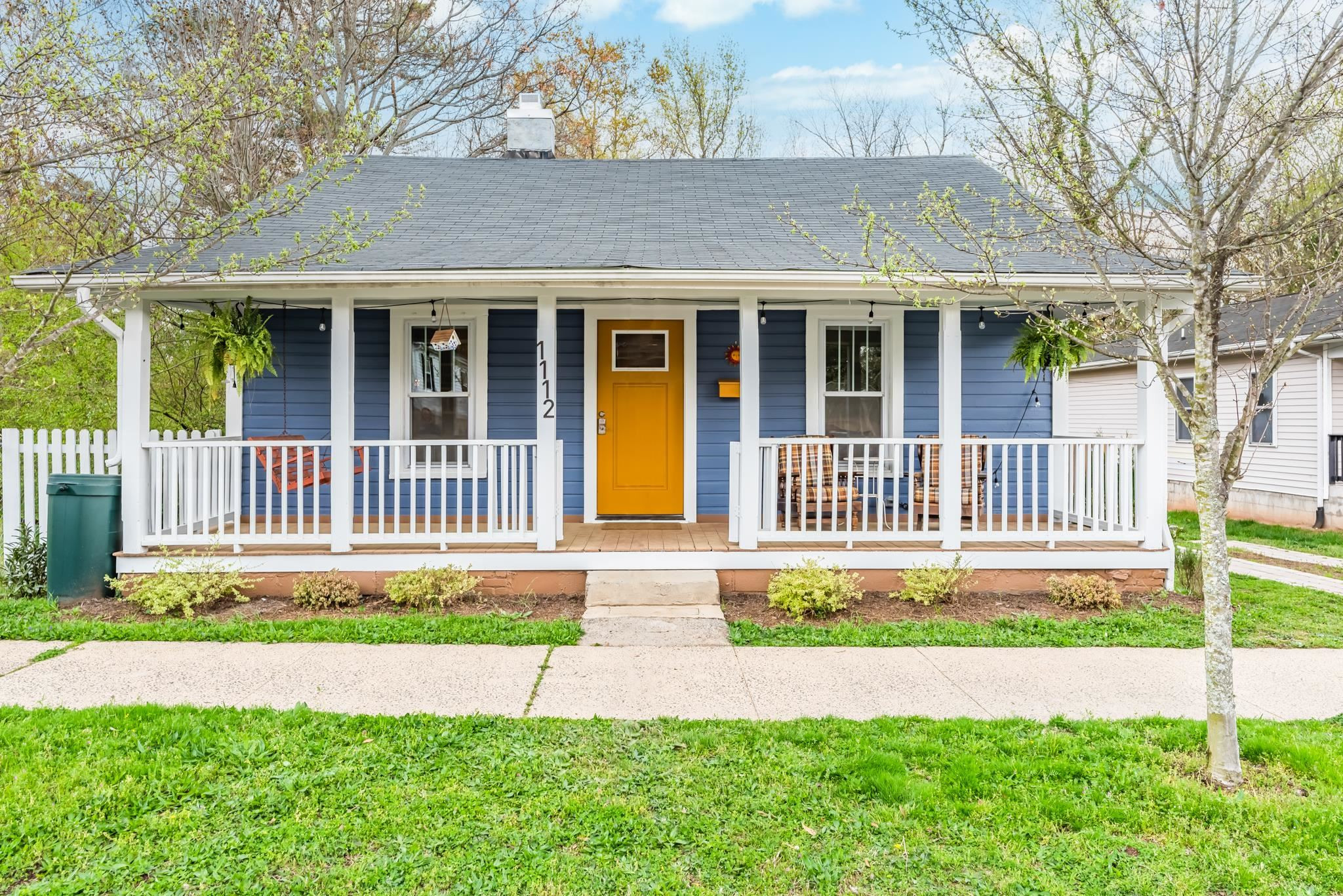 1112 Berkeley Street Durham, NC 27705 - Photo 23 of 23 front view of a house with a yard