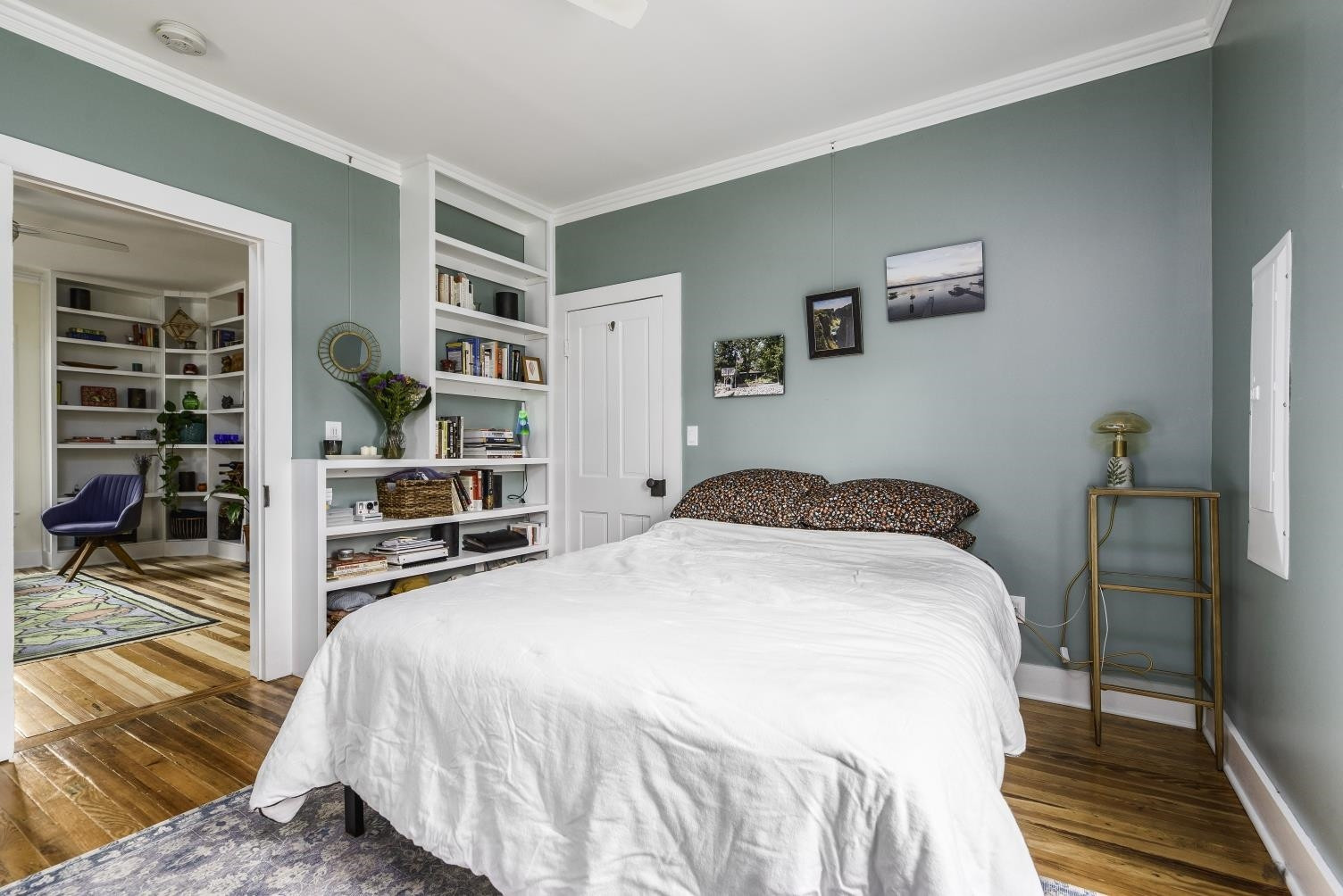 1112 Berkeley Street Durham, NC 27705 - Photo 8 of 23 a bedroom with a bed and walk in closet