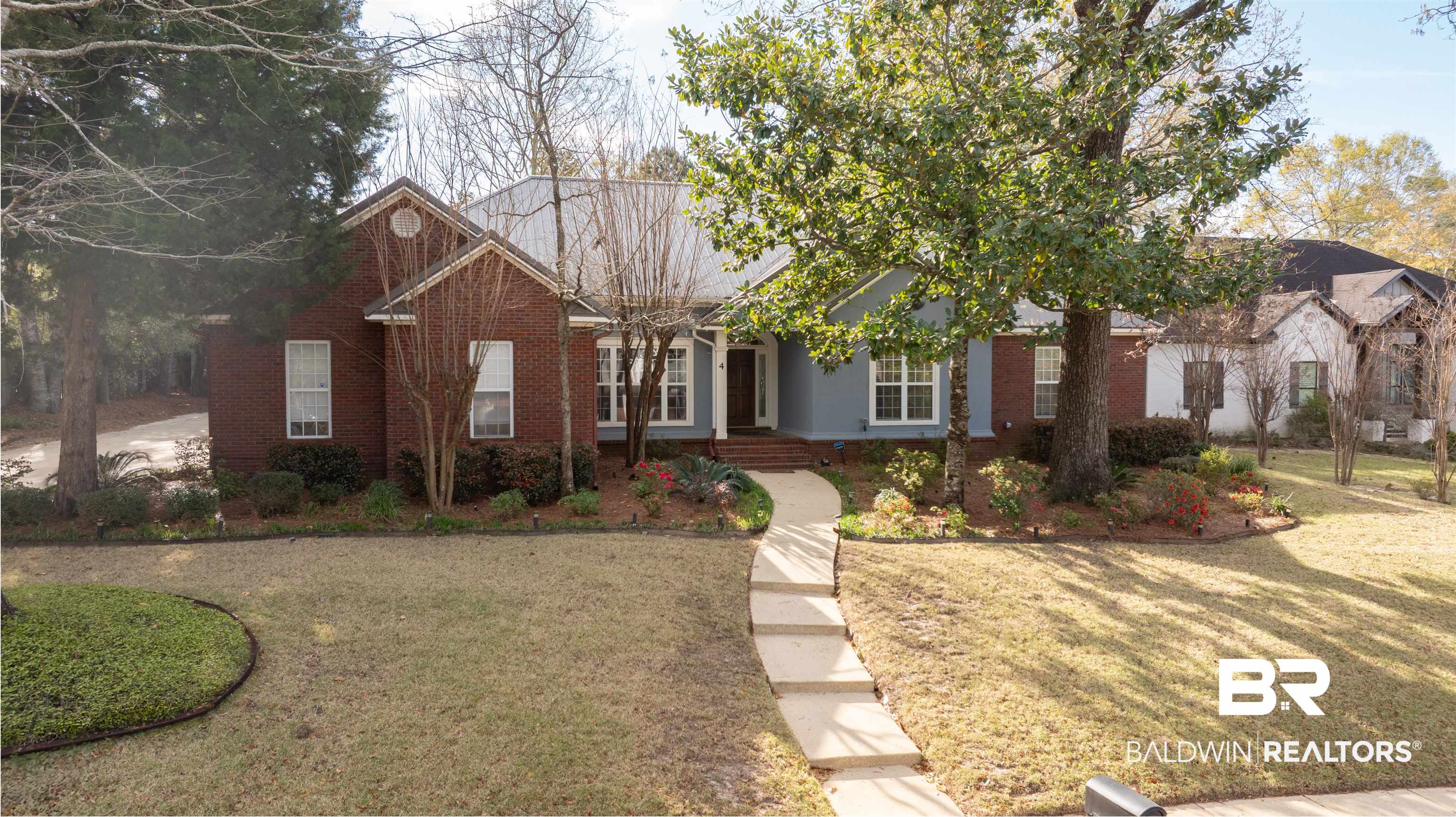 4 Judd Trail Daphne, AL 36527 - Photo 45 of 45 View of front facade with a front lawn and brick siding
