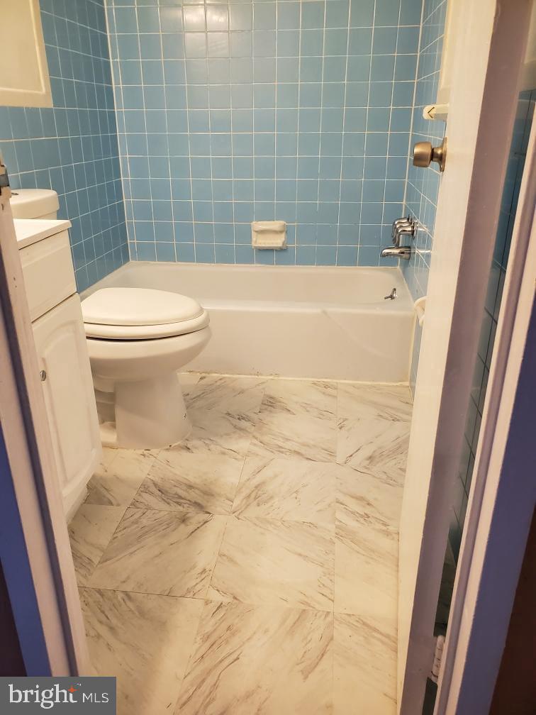 3450 Toledo Terrace, Unit 522 Hyattsville, MD 20782 - Photo 8 of 17 a bathroom with a toilet and a shower