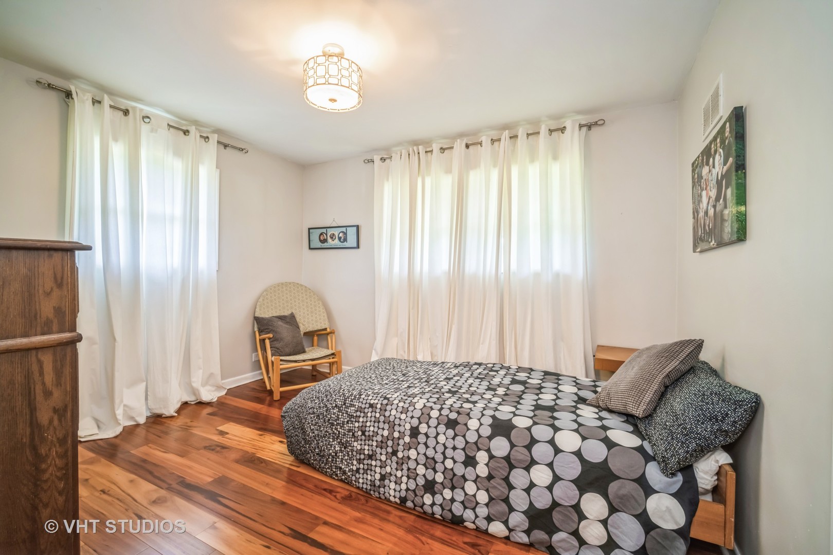 135 Birchwood Road Northbrook, IL 60062 - Photo 11 of 20 a bedroom with a bed and a window