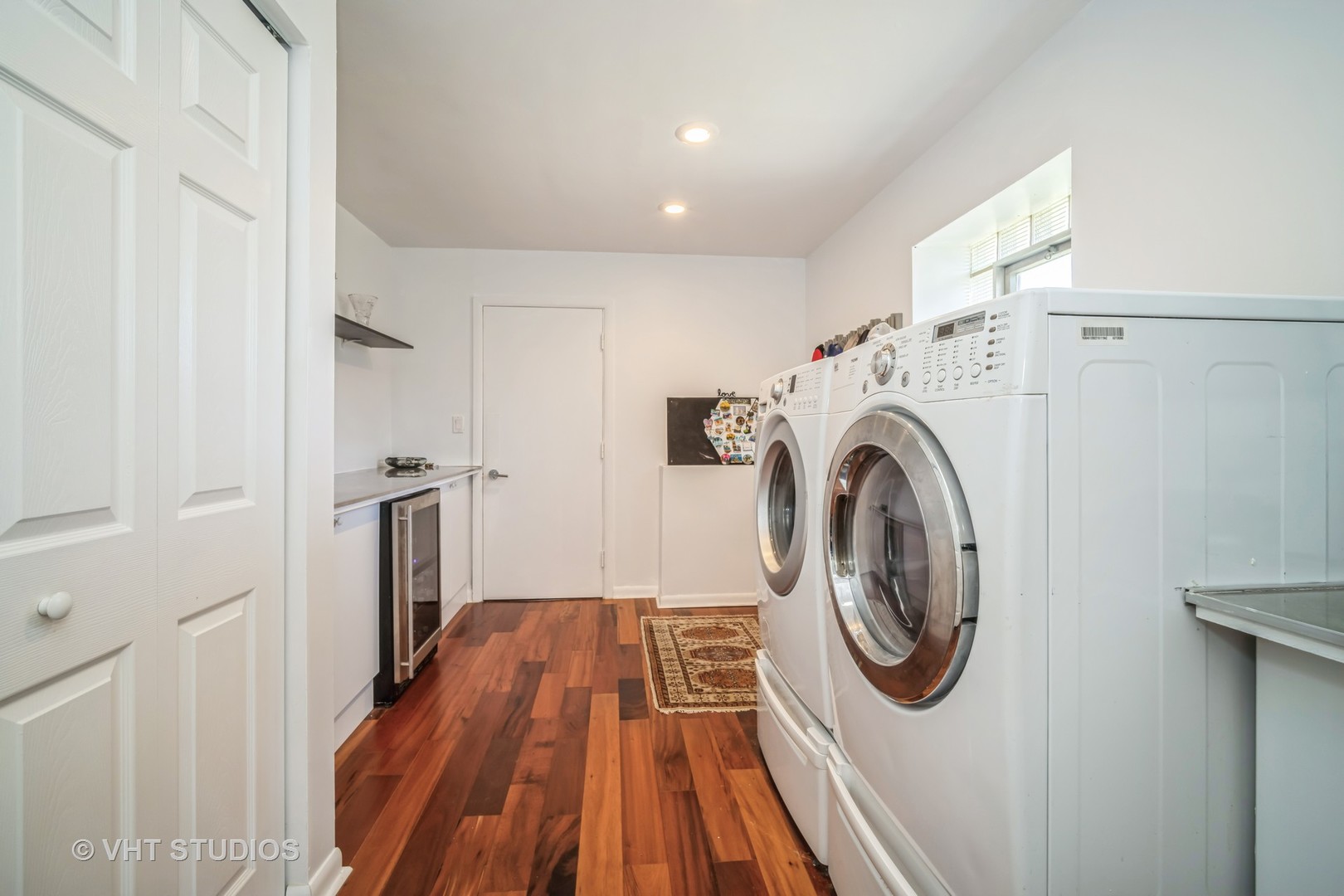 135 Birchwood Road Northbrook, IL 60062 - Photo 13 of 20 a view of a hallway with washer and dryer