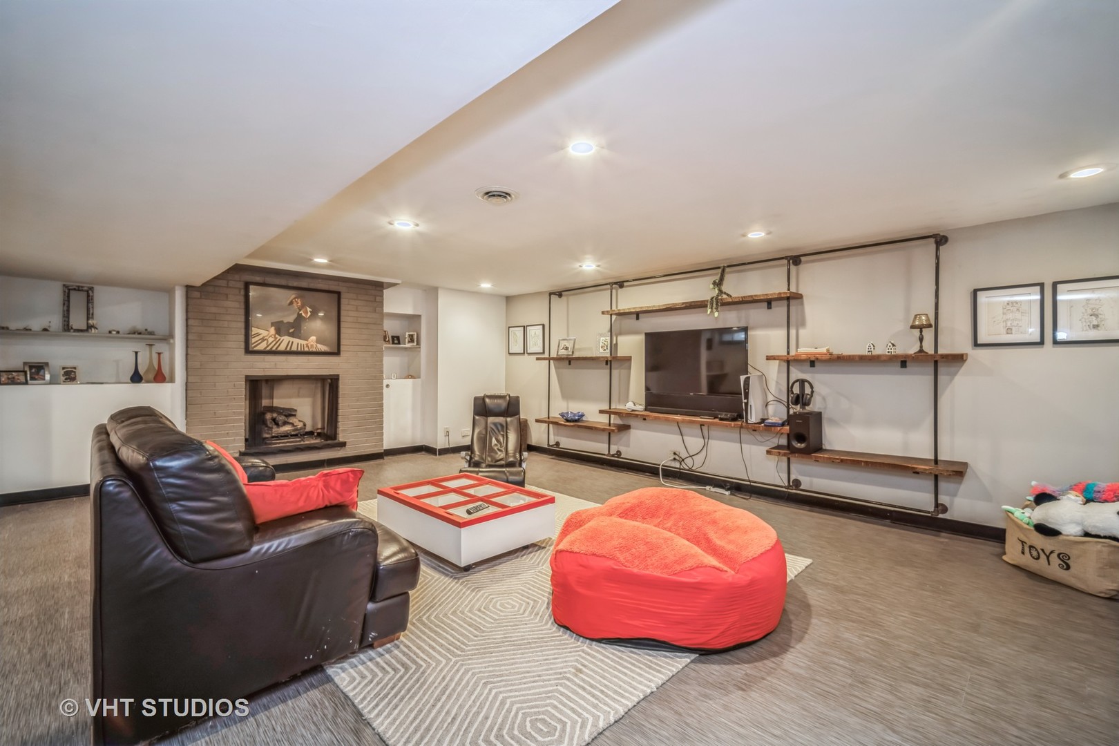 135 Birchwood Road Northbrook, IL 60062 - Photo 14 of 20 a living room with furniture and flat screen tv