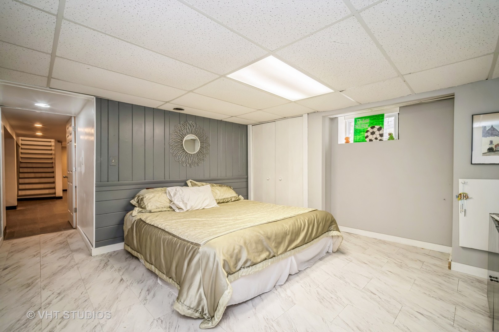 135 Birchwood Road Northbrook, IL 60062 - Photo 17 of 20 a bedroom with a bed and a cabinets