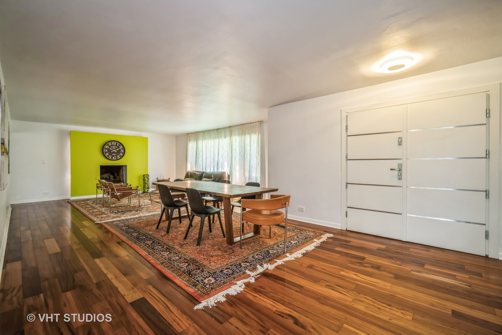 135 Birchwood Road Northbrook, IL 60062 - Photo 3 of 20 a dining room with furniture and wooden floor