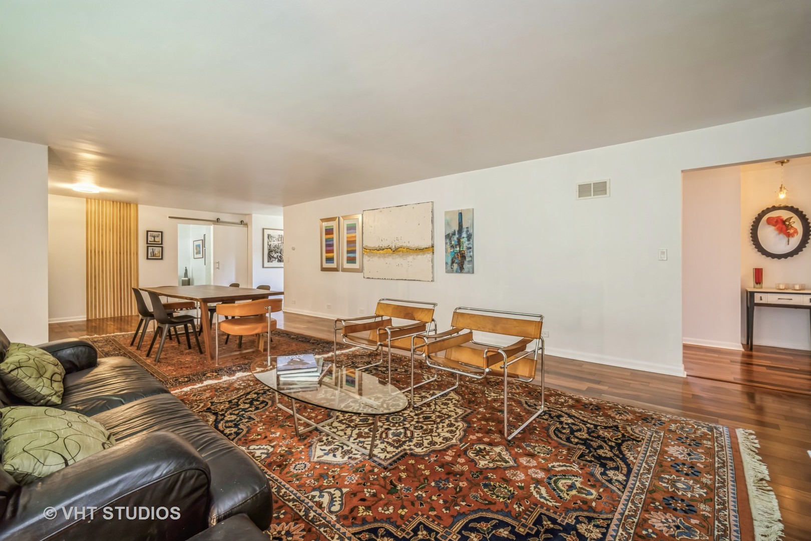 135 Birchwood Road Northbrook, IL 60062 - Photo 4 of 20 a living room with furniture and wooden floor