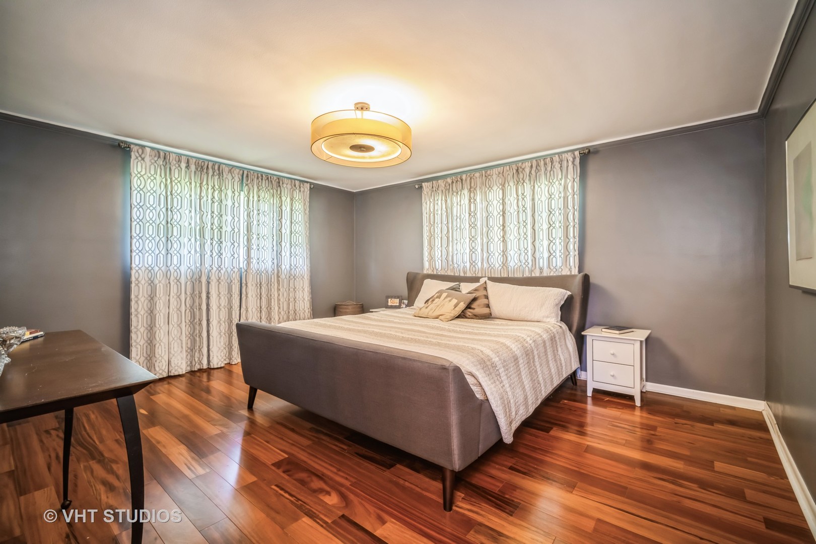 135 Birchwood Road Northbrook, IL 60062 - Photo 10 of 20 a bedroom with a bed and a large window