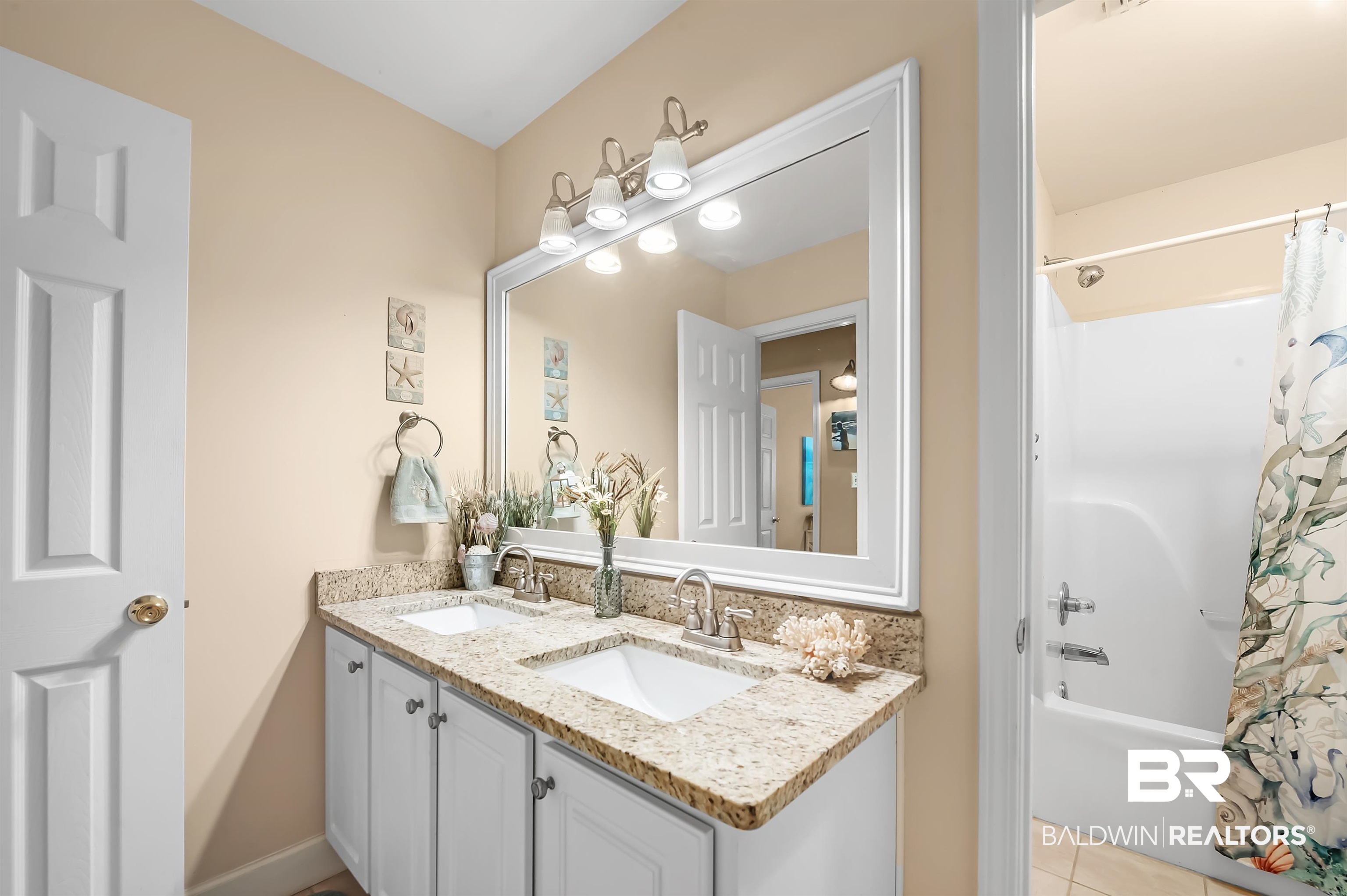 9901 Glover Court Fairhope, AL 36532 - Photo 29 of 52 Bathroom with shower / bath combo with shower curtain, tile patterned flooring, and vanity