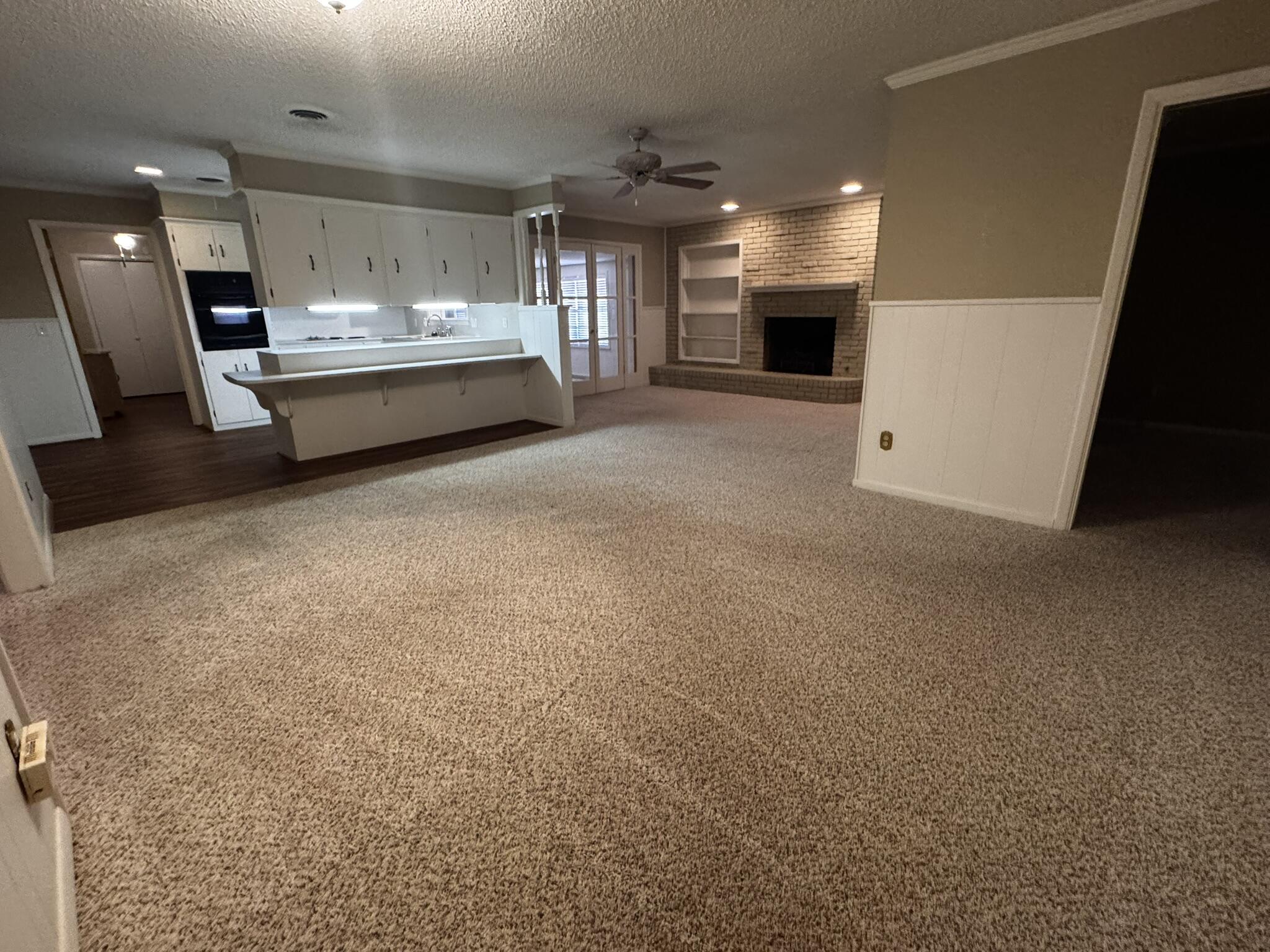 1304 Floydada Plainview, TX 79072 - Photo 11 of 49 a large kitchen with a large window