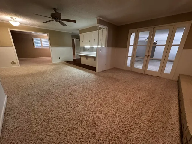 a view of livingroom with furniture and windows