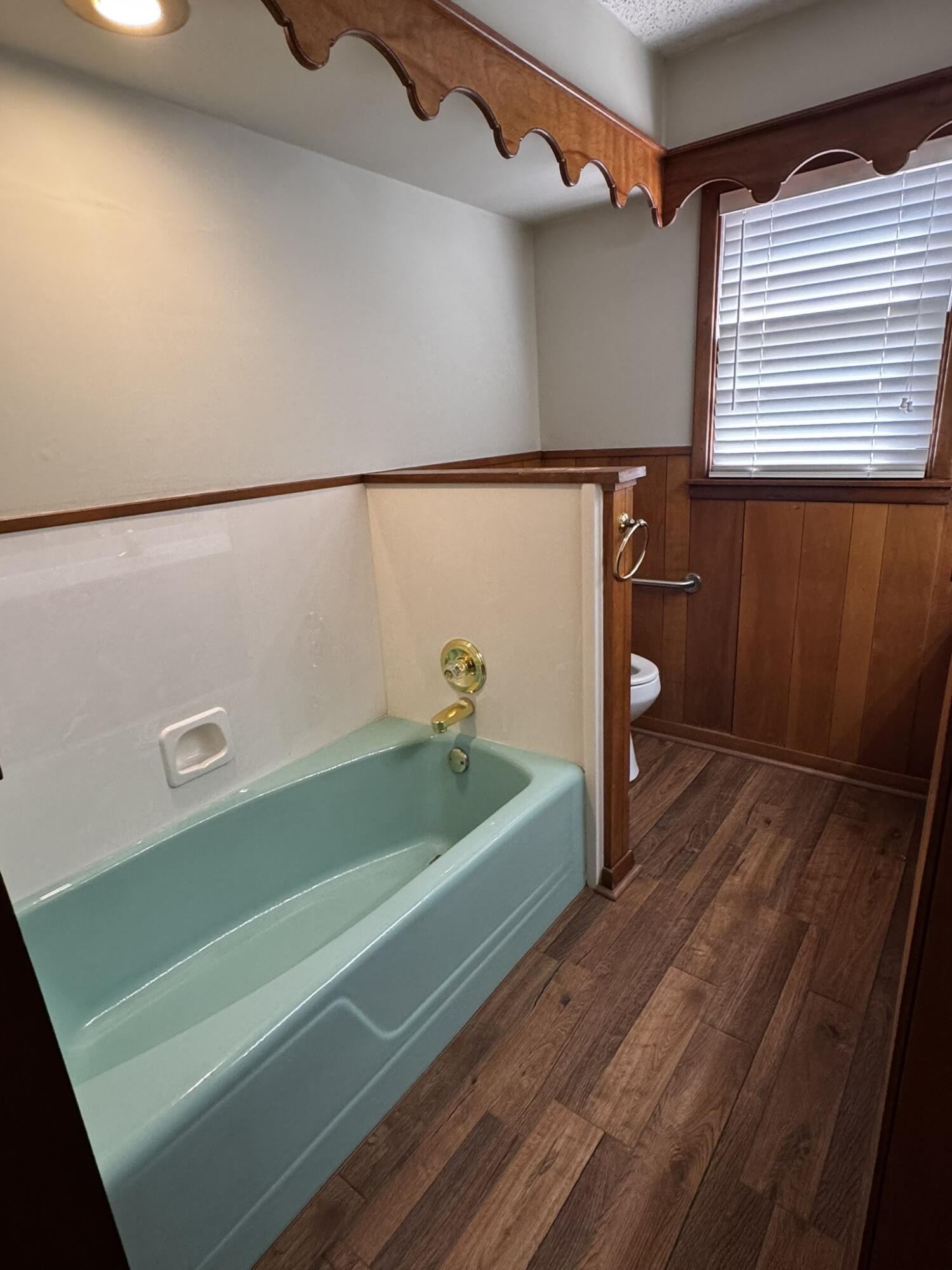 1304 Floydada Plainview, TX 79072 - Photo 33 of 49 a bathroom with a sink and a bathtub