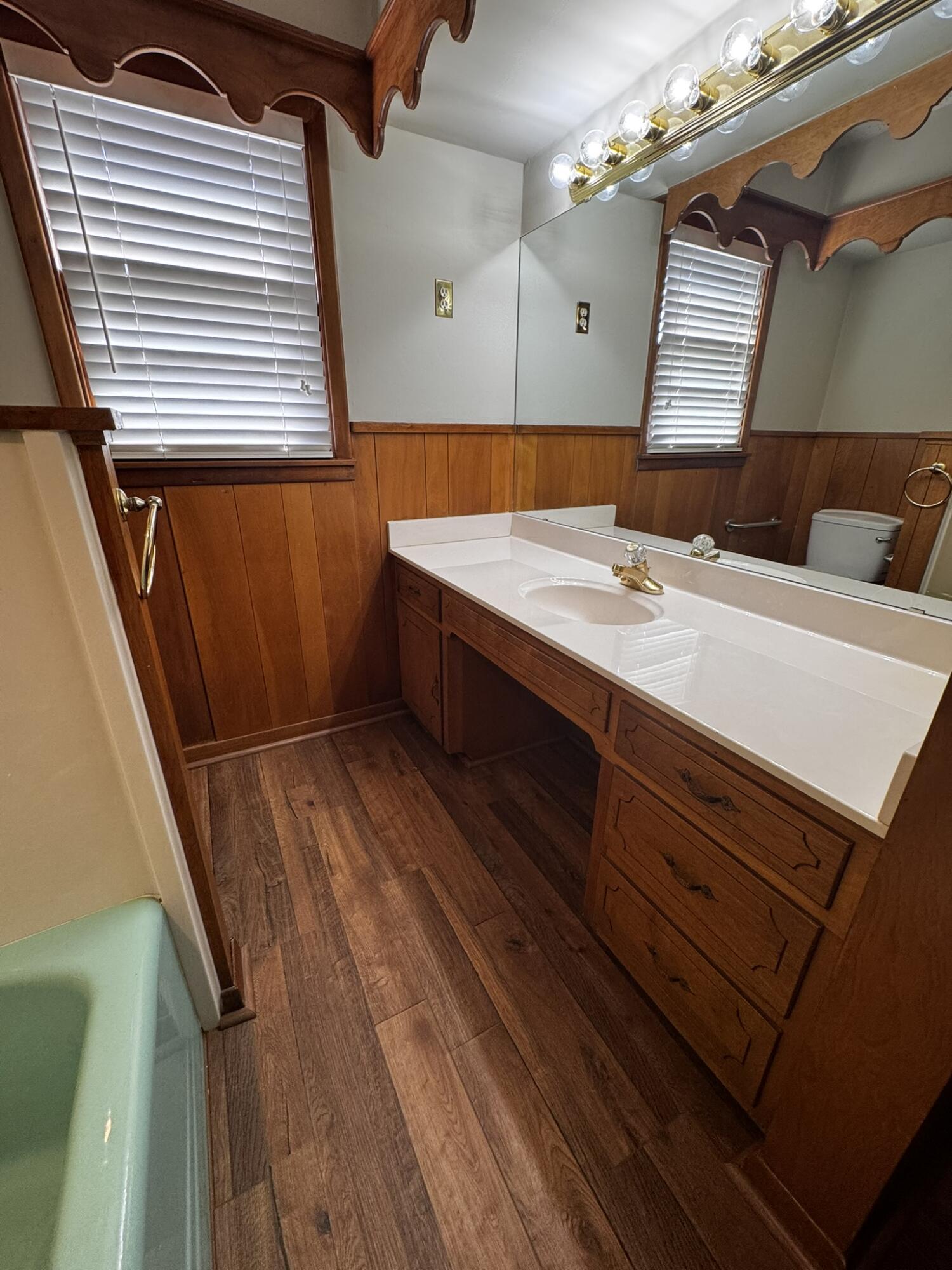 1304 Floydada Plainview, TX 79072 - Photo 34 of 49 a bathroom with a sink and a mirror