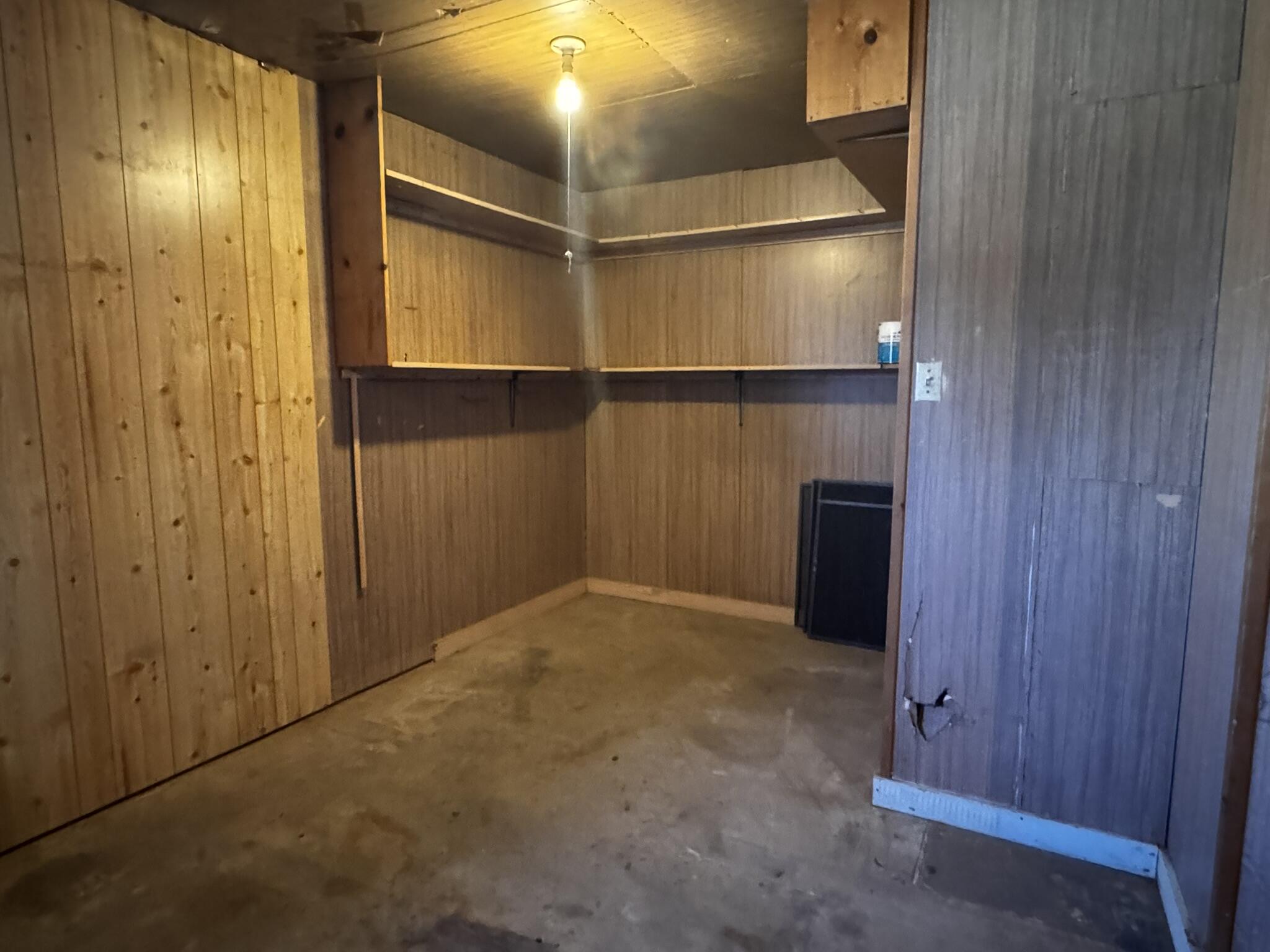 1304 Floydada Plainview, TX 79072 - Photo 45 of 49 a view of an empty room with wooden floor