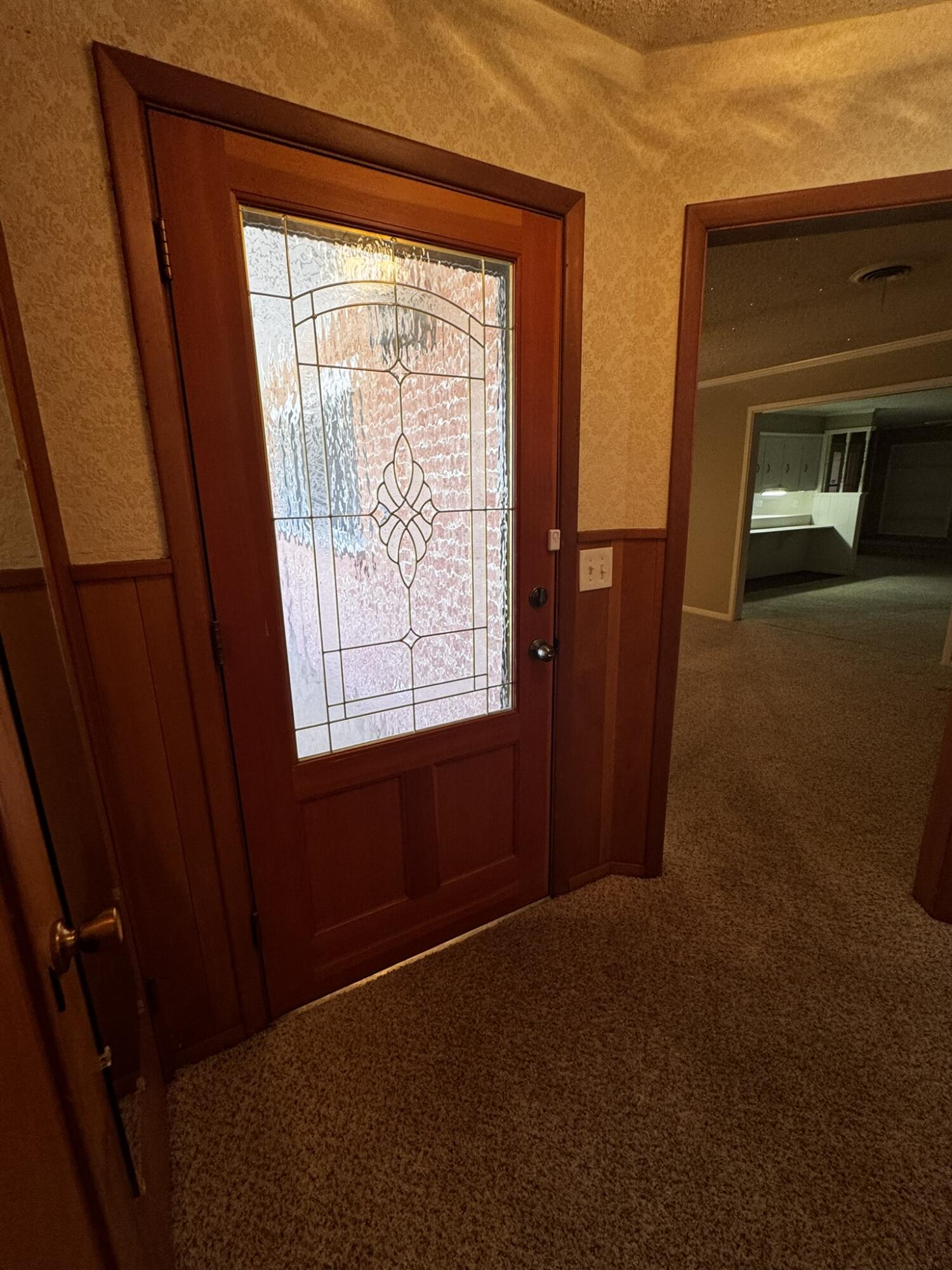 1304 Floydada Plainview, TX 79072 - Photo 8 of 49 a view of an empty room with a window