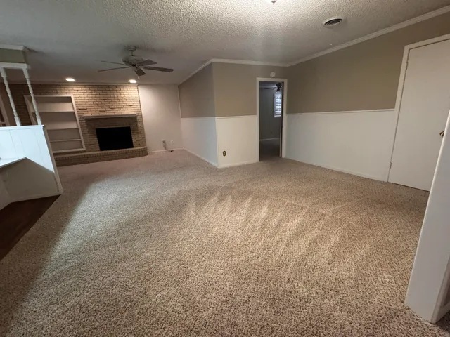a view of a livingroom with a fireplace