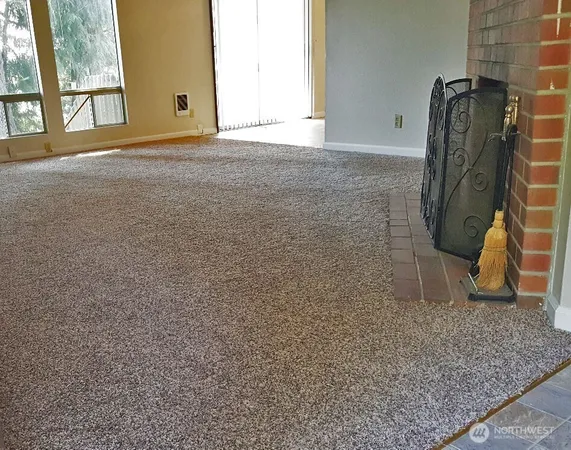 a view of an empty room and window