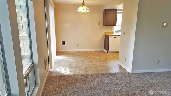 a view of a livingroom from a hallway