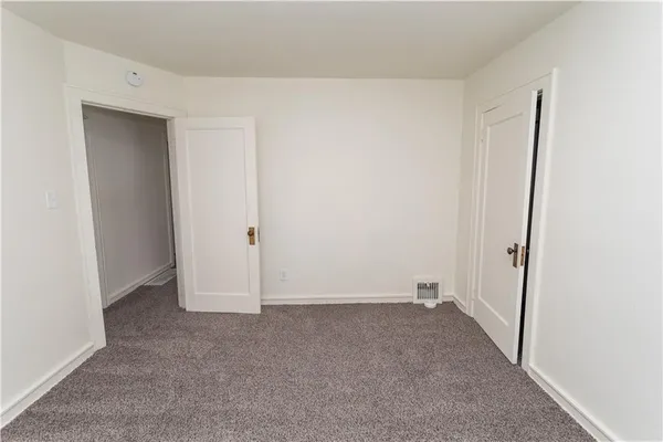 an empty room with an entryway