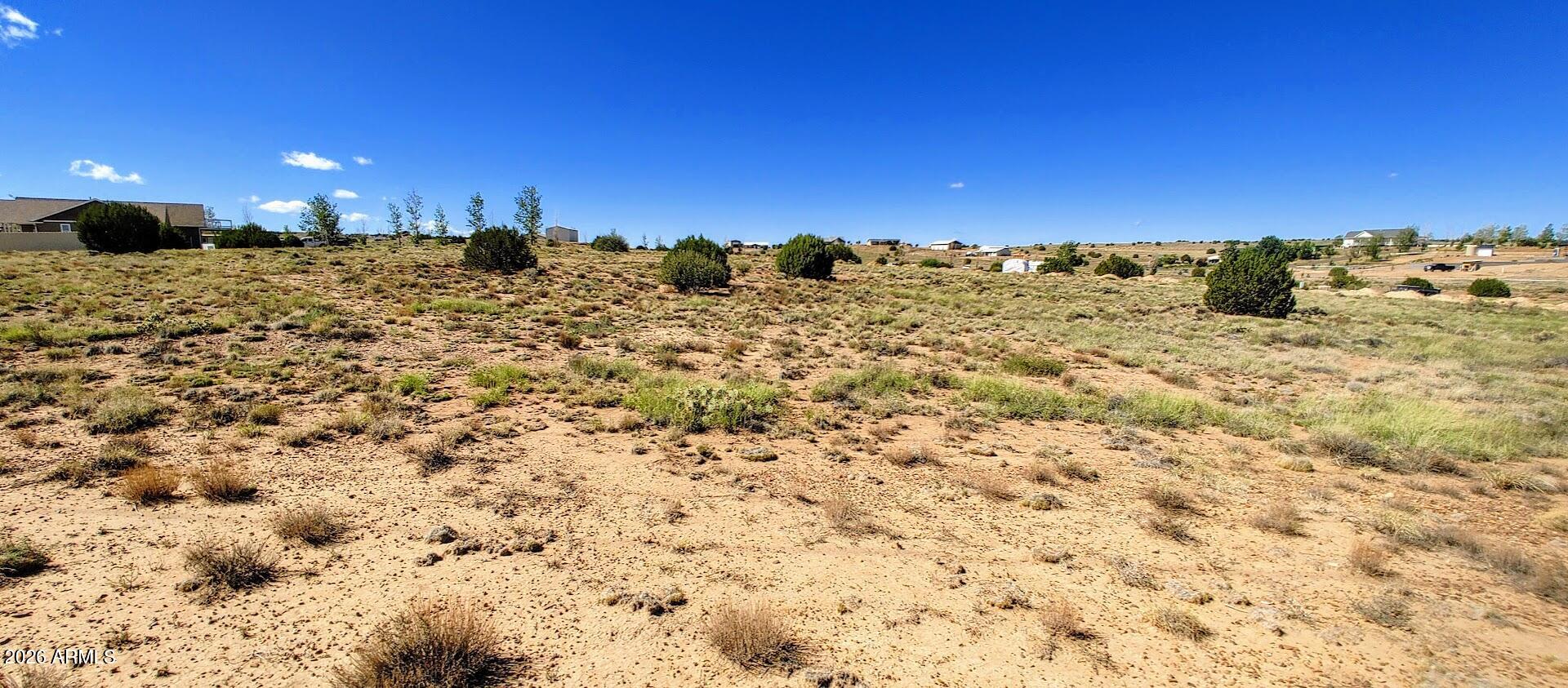 1190 Haystack Road, Unit 68 Taylor, AZ 85939 - Photo 2 of 7 a view of a large building with a snow in the background