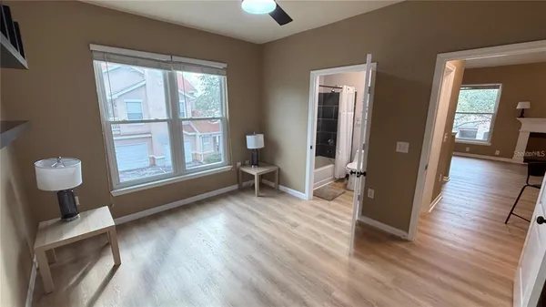 a view of a livingroom with wooden floor