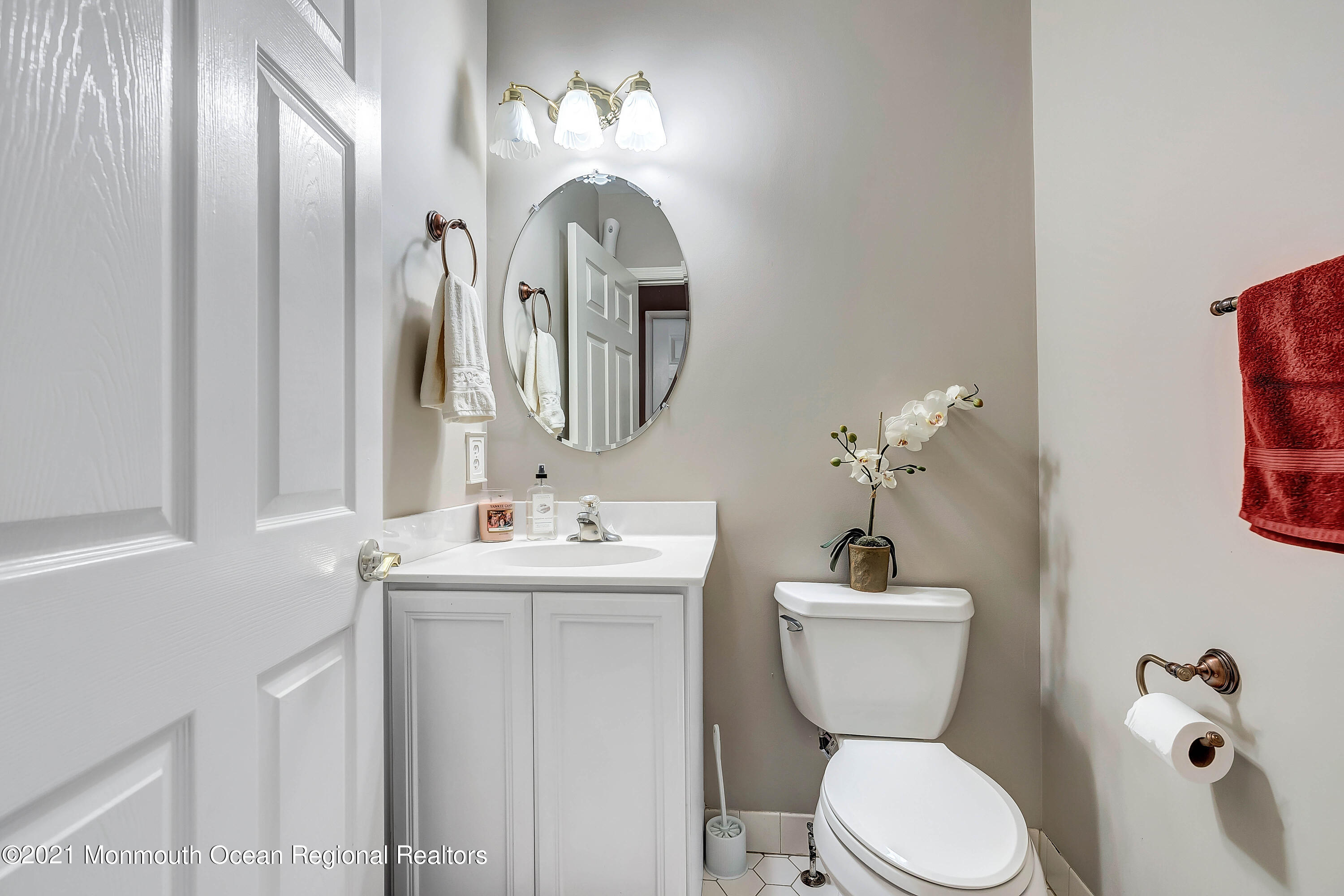 2 MacKenzie Road Eatontown, NJ 07724 - Photo 14 of 53 a bathroom with a toilet sink and mirror