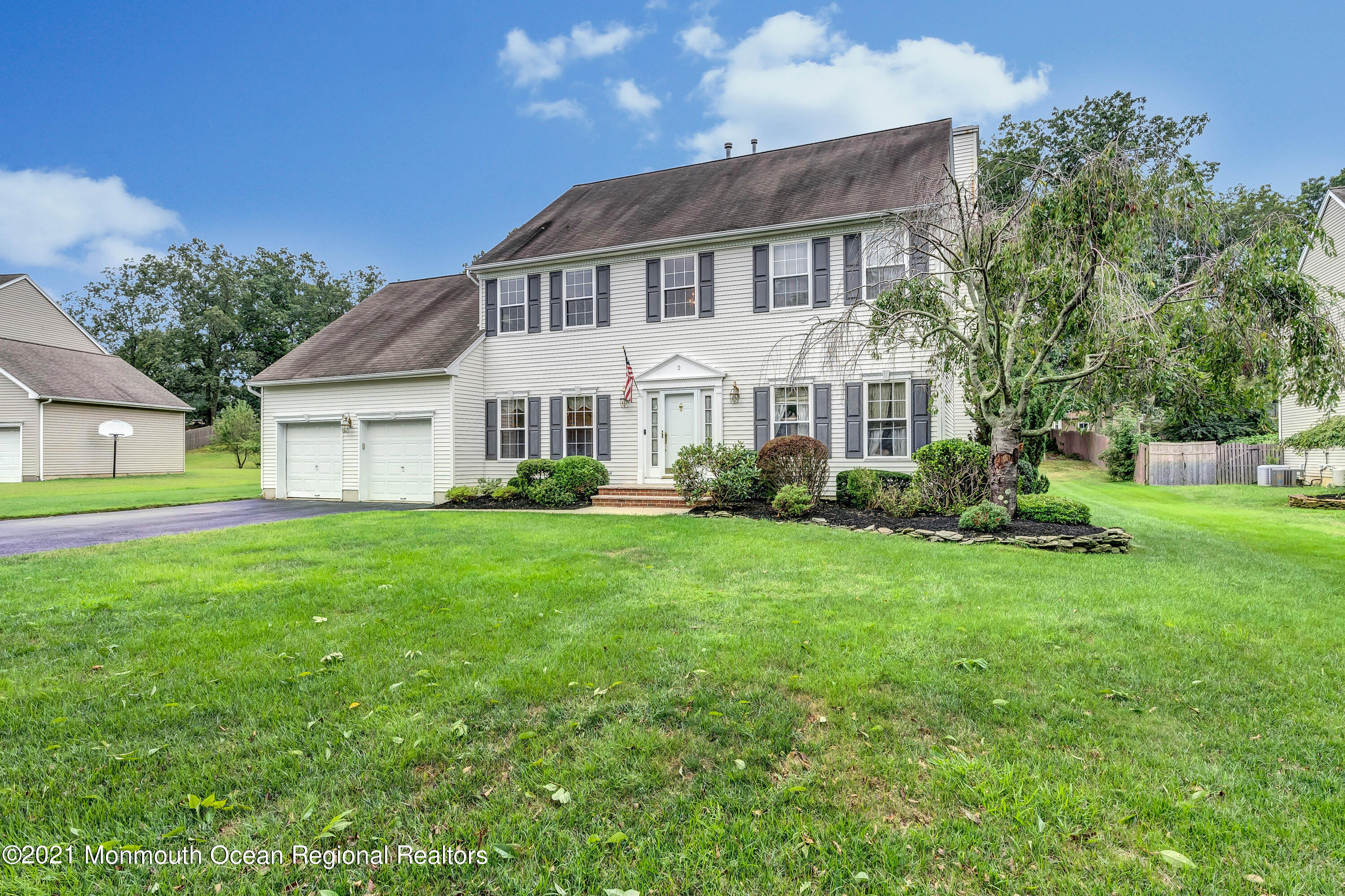 2 MacKenzie Road Eatontown, NJ 07724 - Photo 50 of 53 a front view of house with yard and green space