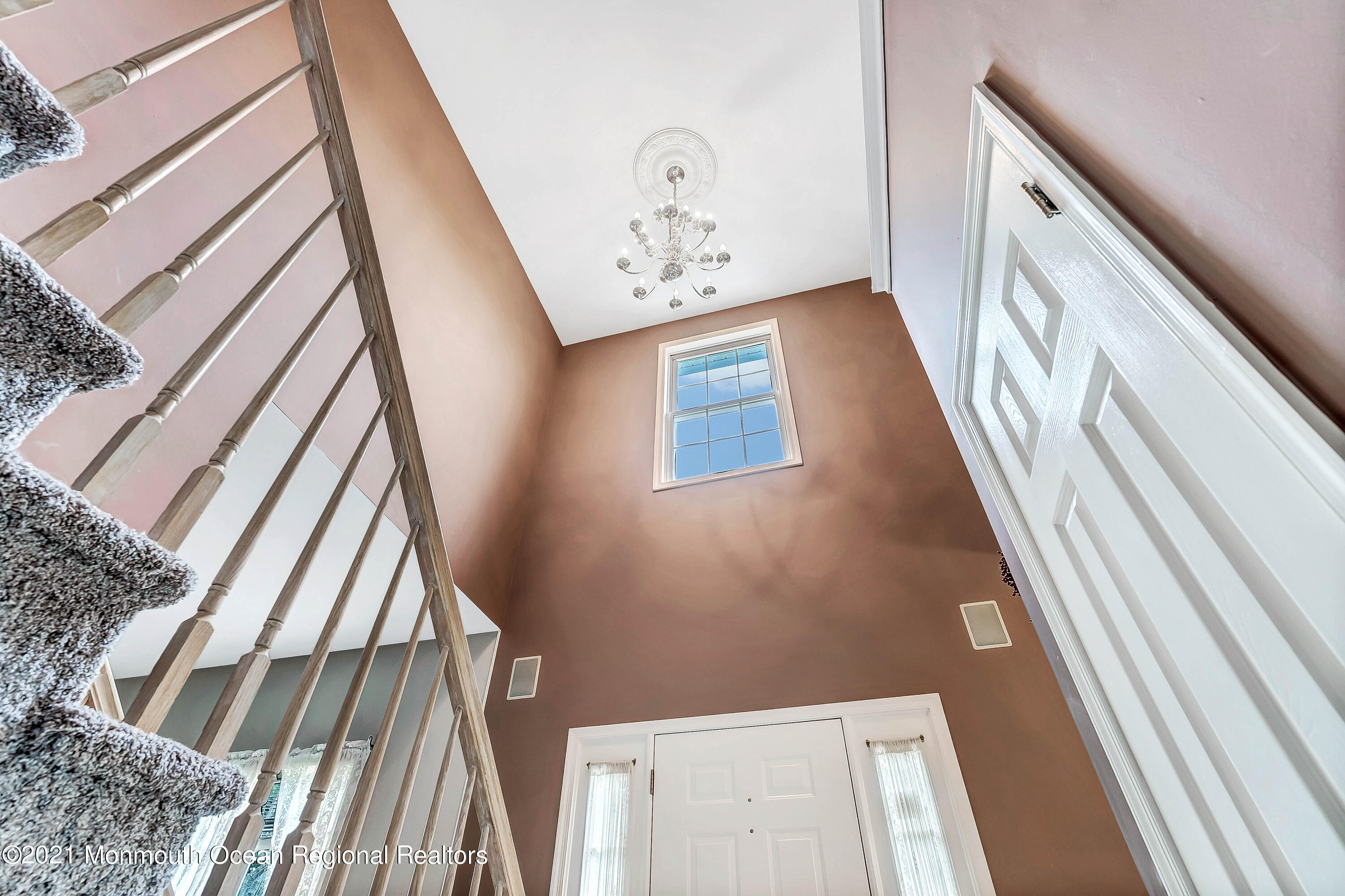 2 MacKenzie Road Eatontown, NJ 07724 - Photo 8 of 53 a view of staircase with large window