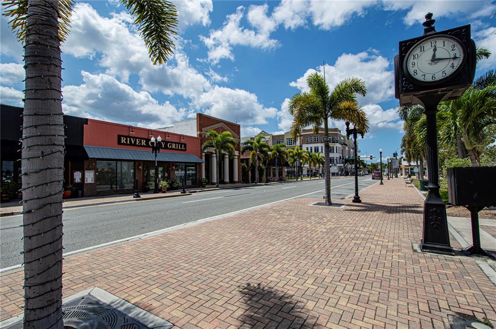 22375 Edgewater Drive, Unit 238 Punta Gorda, FL 33980 - Photo 49 of 57 a sign board with a clock on the wall