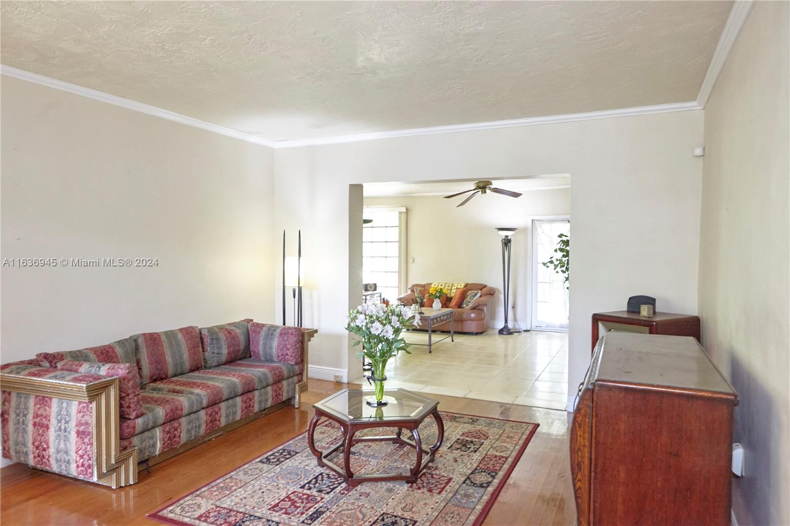 Central Gables Coral Gables, FL 33134 - Photo 21 of 45 large living room connecting to a large family room