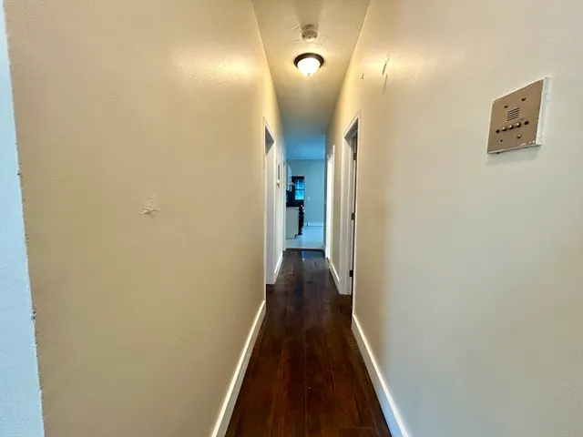 a view of hallway with stairs