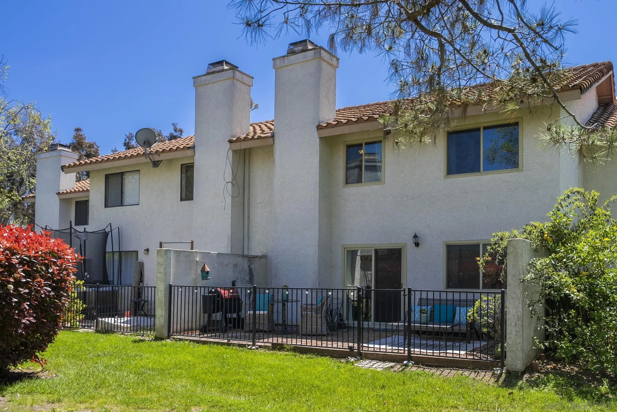6561 Corte Cisco Carlsbad, CA 92009 - Photo 29 of 36 a view of a house with backyard and sitting area