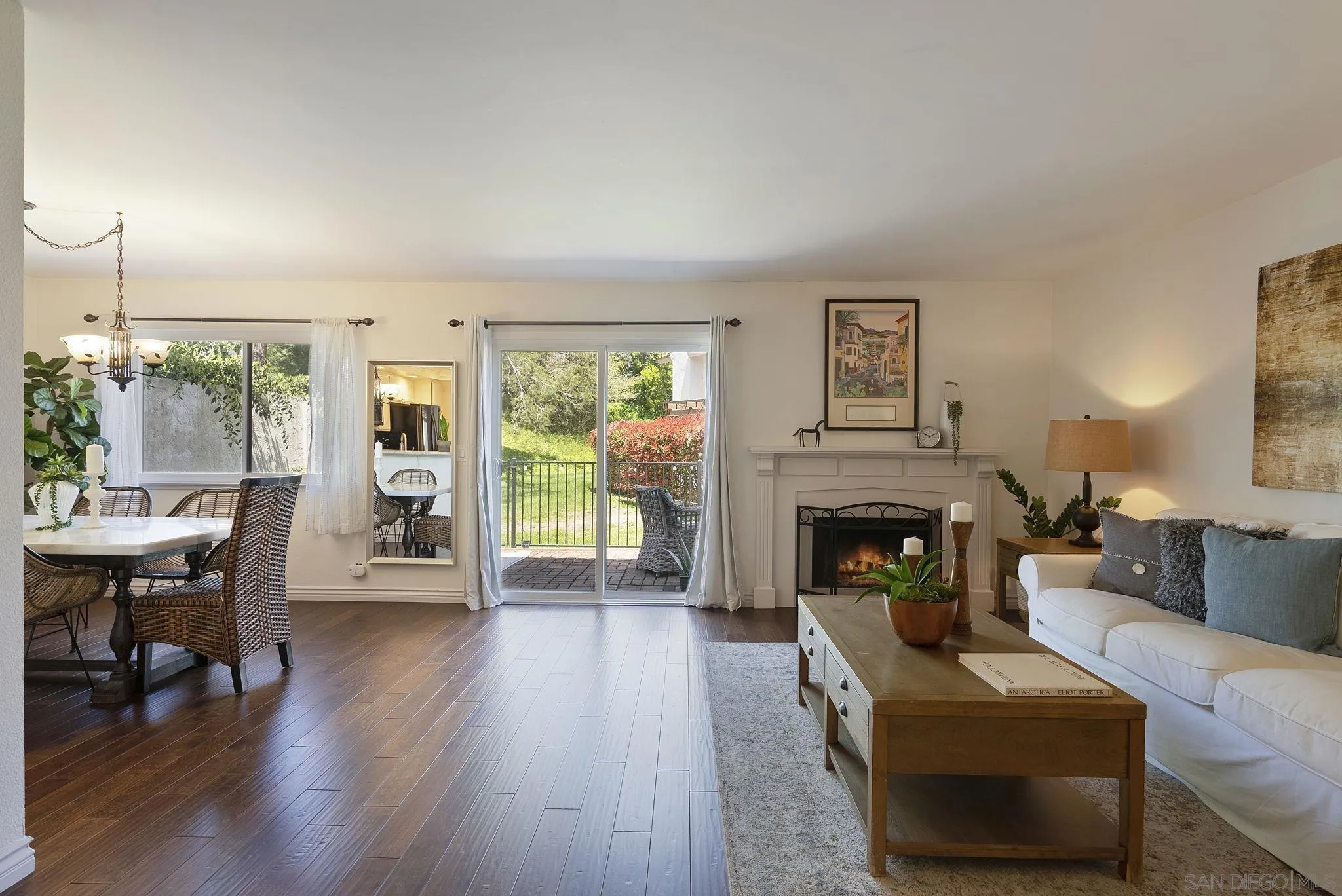 6561 Corte Cisco Carlsbad, CA 92009 - Photo 4 of 36 a living room with furniture and a fireplace