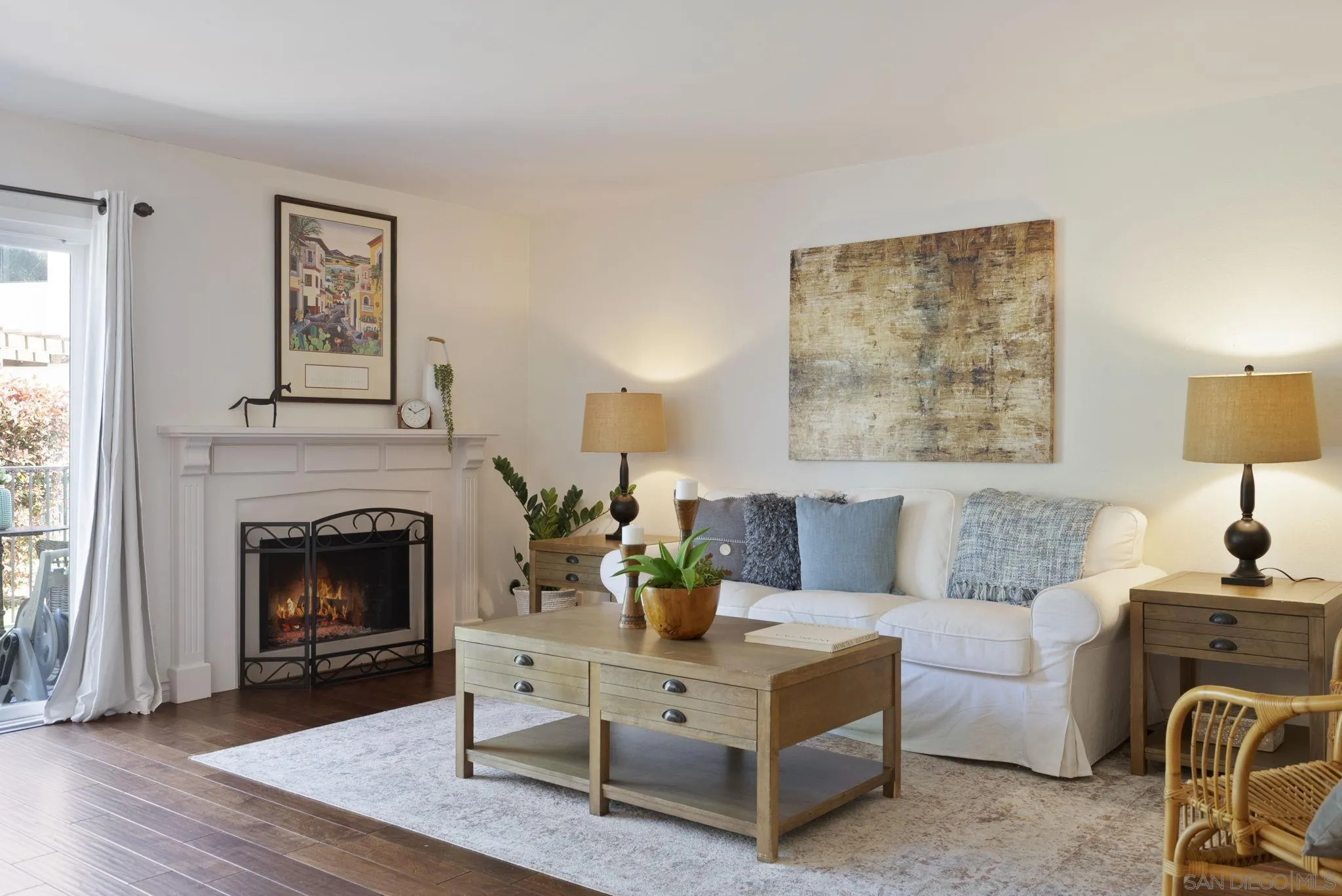 6561 Corte Cisco Carlsbad, CA 92009 - Photo 5 of 36 a living room with furniture and a fireplace