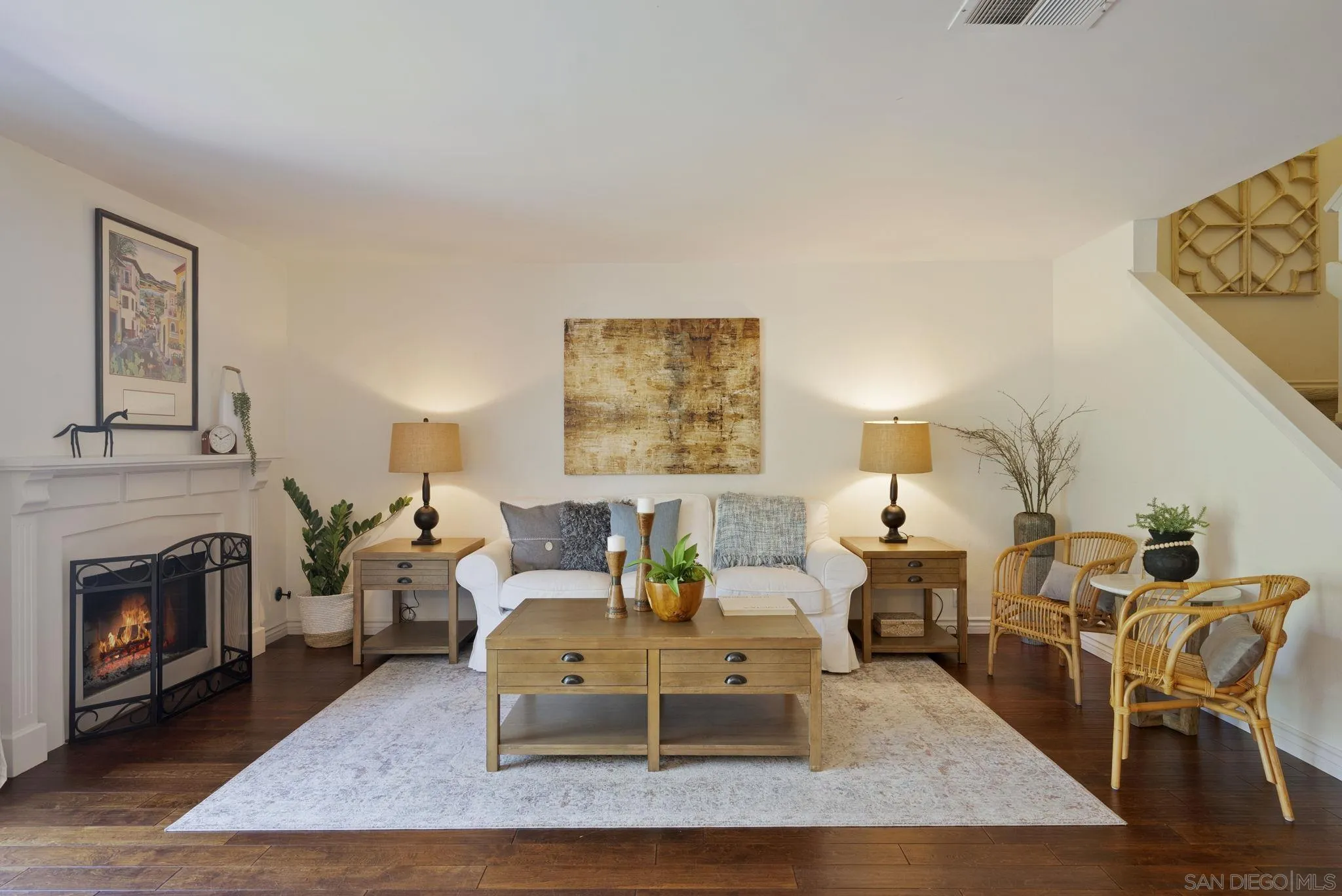 6561 Corte Cisco Carlsbad, CA 92009 - Photo 6 of 36 a living room with furniture and a fireplace