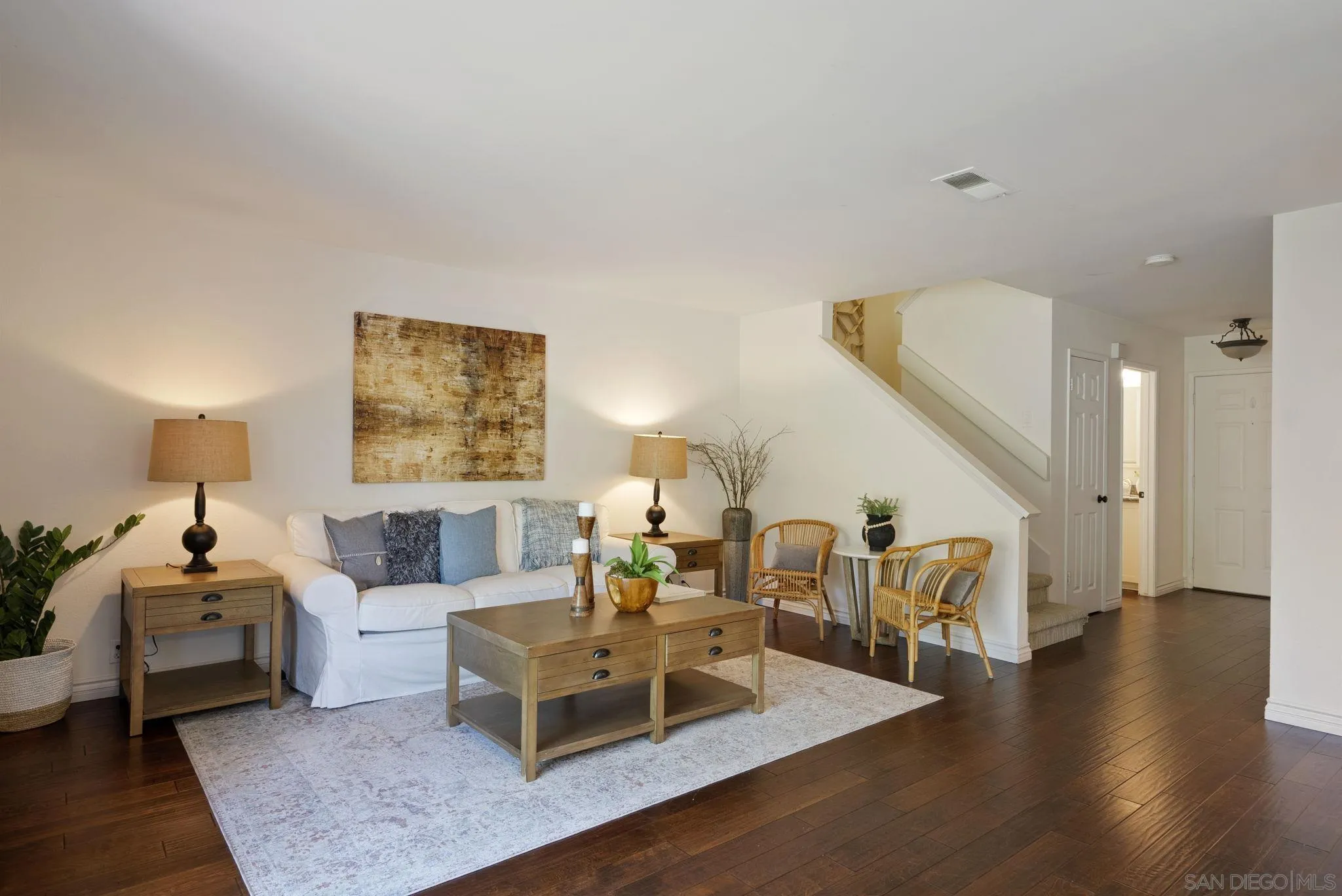 6561 Corte Cisco Carlsbad, CA 92009 - Photo 7 of 36 a living room with furniture and wooden floor