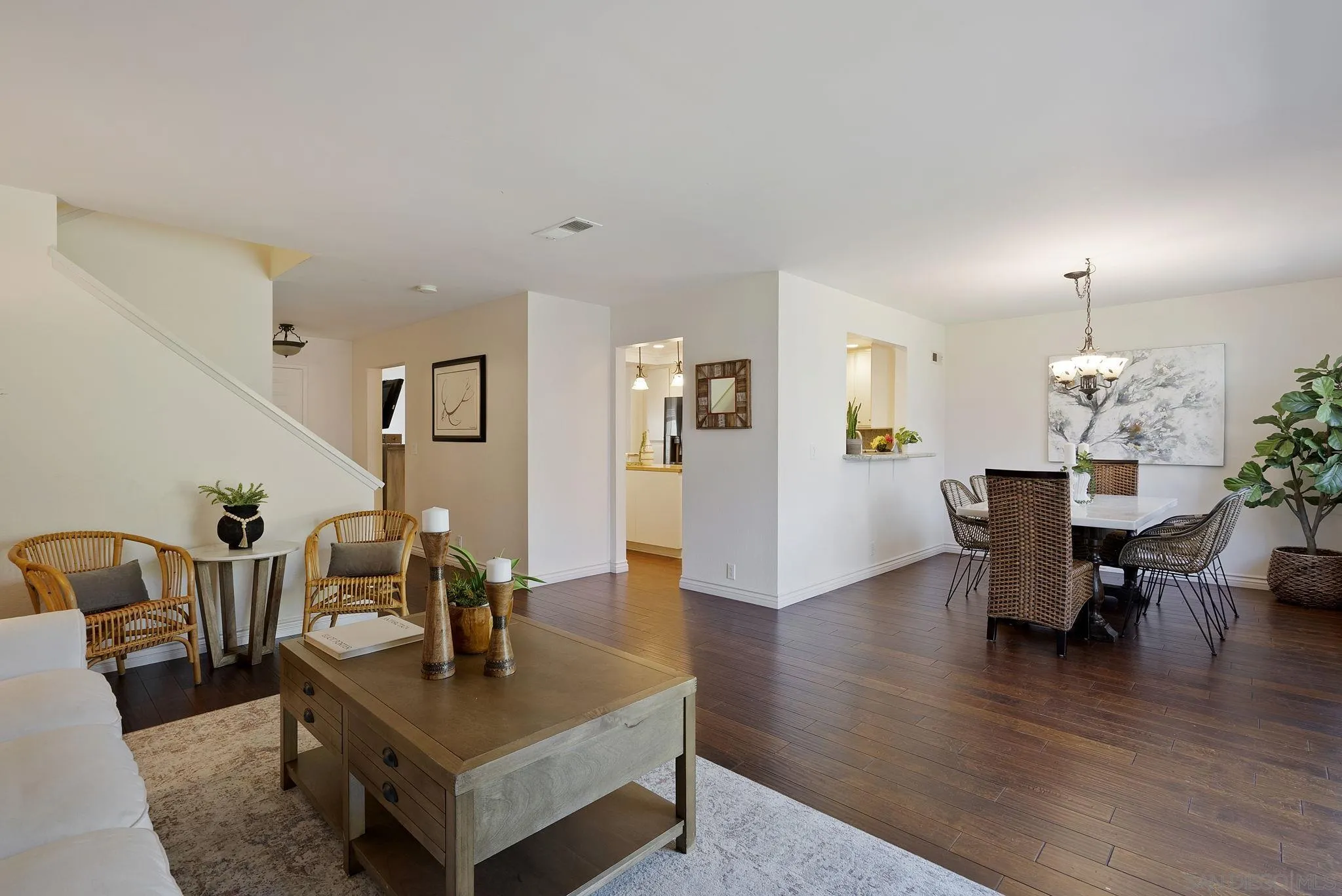 6561 Corte Cisco Carlsbad, CA 92009 - Photo 10 of 36 a living room with furniture and wooden floor