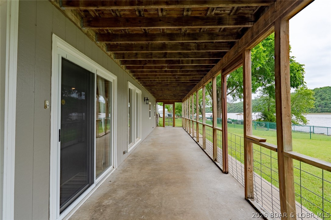 3135 Lick Creek Road Edwards, MO 65326 - Photo 62 of 94 lower level patio
